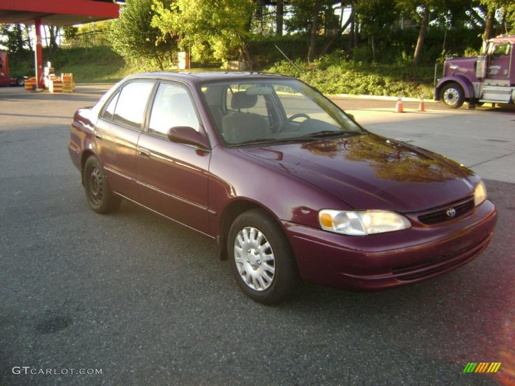 1998 Corolla LE - Ruby Red Pearl Metallic / Beige photo #1