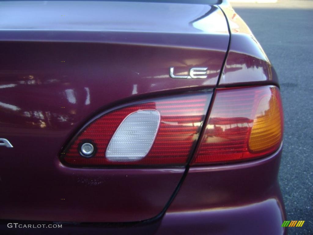 1998 Corolla LE - Ruby Red Pearl Metallic / Beige photo #5