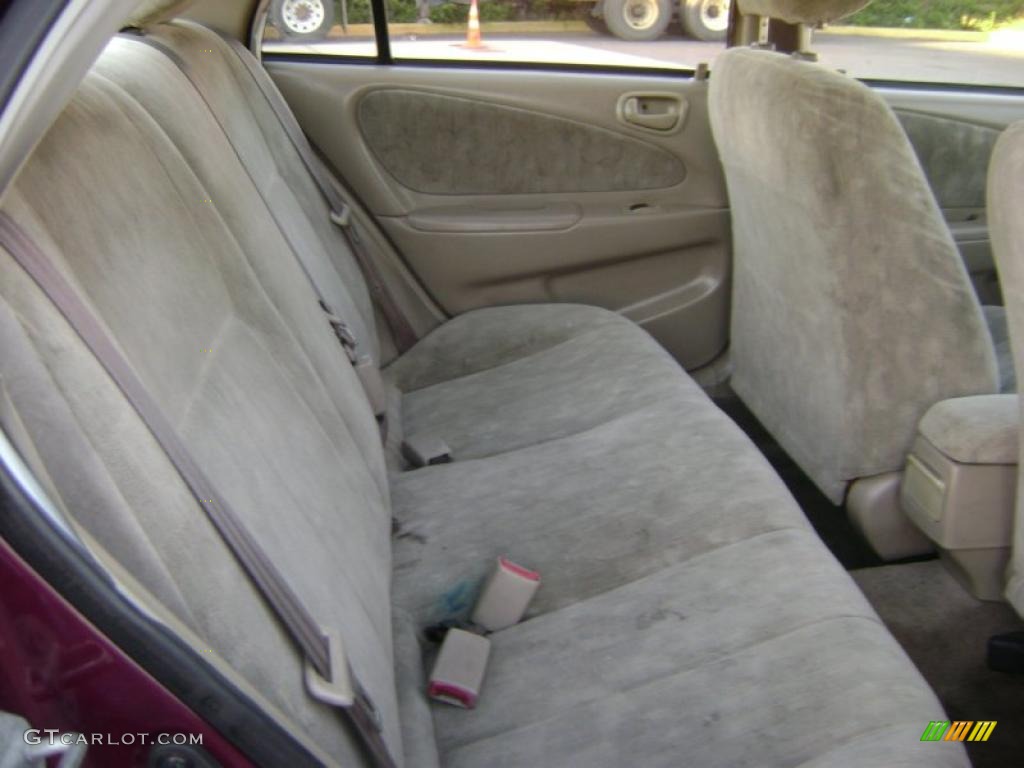 1998 Corolla LE - Ruby Red Pearl Metallic / Beige photo #6