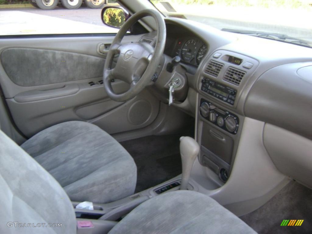 1998 Corolla LE - Ruby Red Pearl Metallic / Beige photo #7