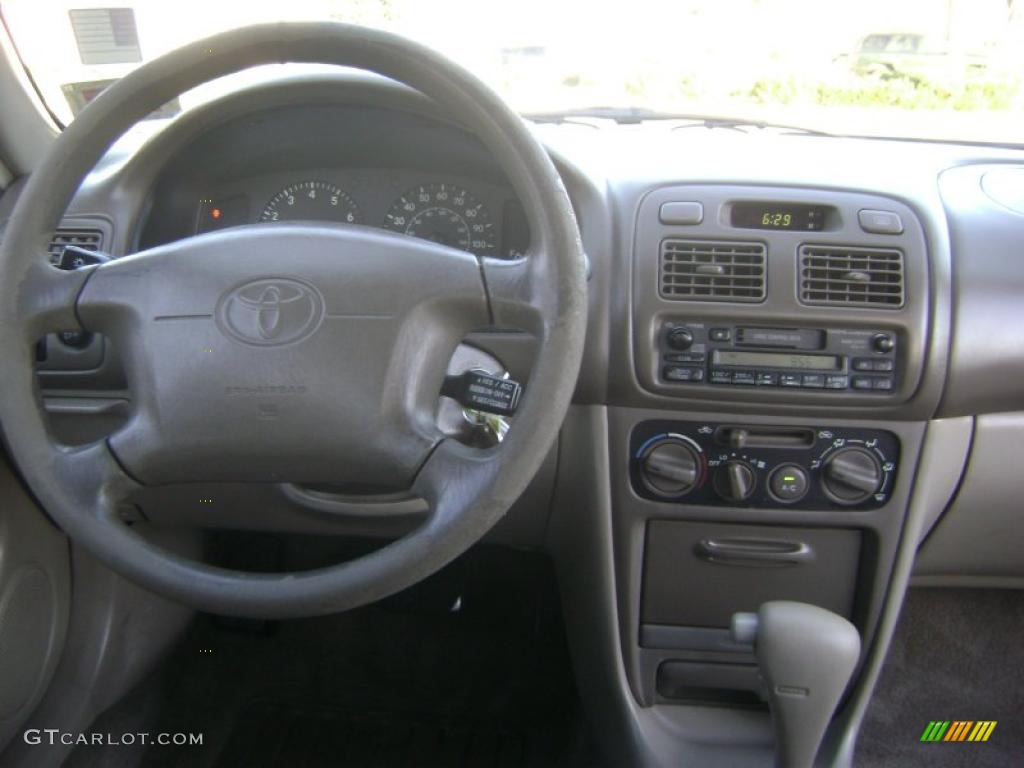 1998 Corolla LE - Ruby Red Pearl Metallic / Beige photo #8
