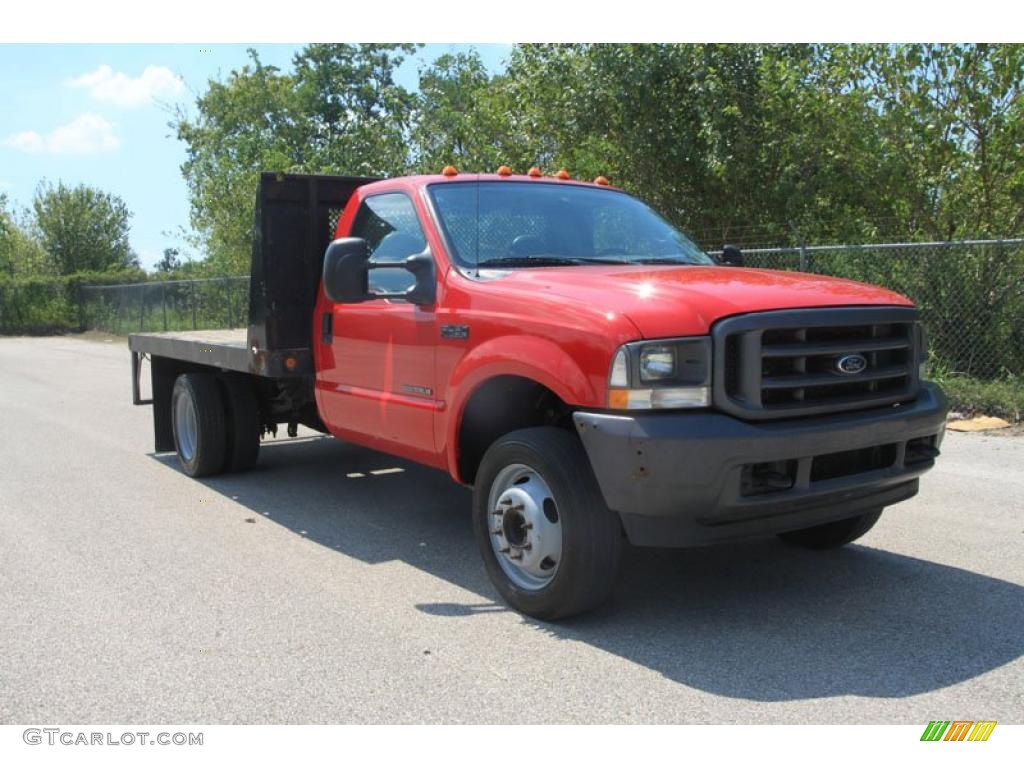 2003 F450 Super Duty XL Regular Cab Chassis Stake Truck - Bright Red / Medium Flint photo #1