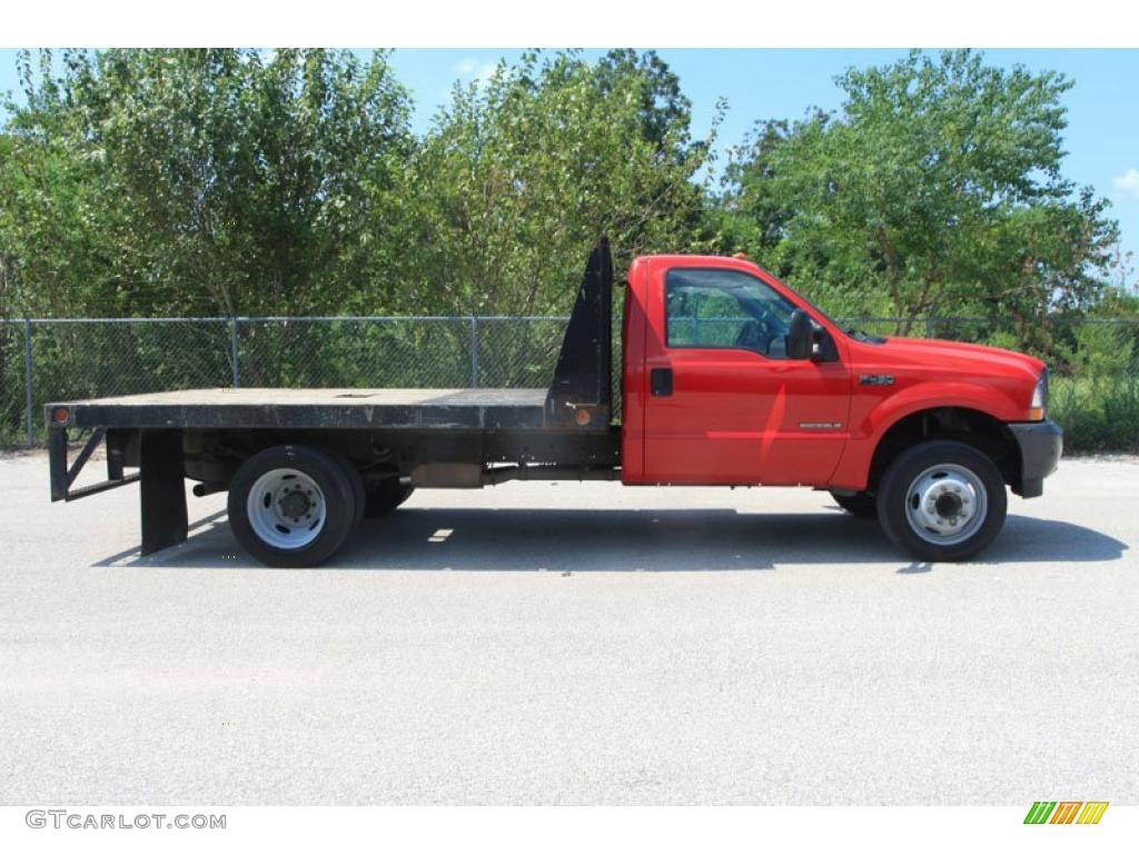 2003 F450 Super Duty XL Regular Cab Chassis Stake Truck - Bright Red / Medium Flint photo #2