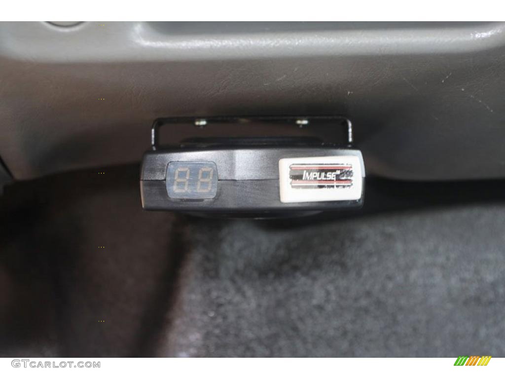 2003 F450 Super Duty XL Regular Cab Chassis Stake Truck - Bright Red / Medium Flint photo #14