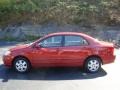 2006 Impulse Red Pearl Toyota Corolla LE  photo #1