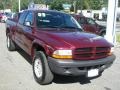 2003 Dark Garnet Red Pearl Dodge Dakota SXT Club Cab 4x4  photo #1