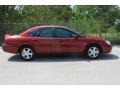 2002 Matador Red Metallic Ford Taurus SES  photo #2