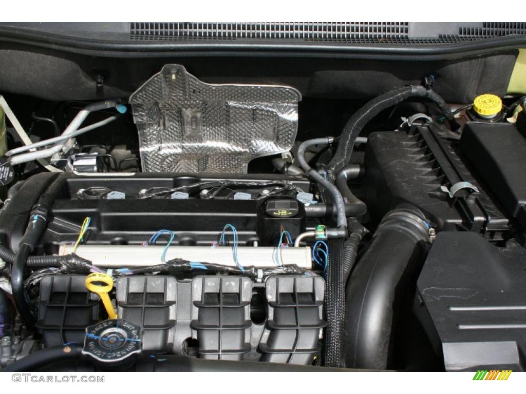 2010 Caliber SXT - Optic Green Metallic / Dark Slate Gray photo #19