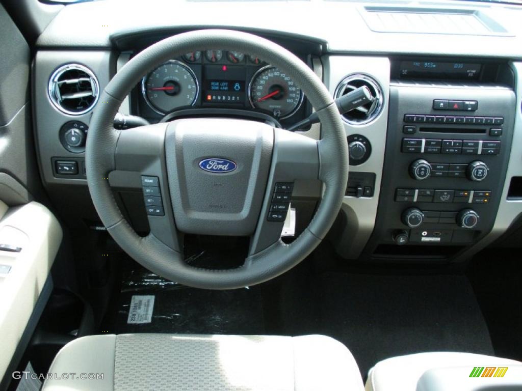 2010 F150 XLT SuperCrew 4x4 - Dark Blue Pearl Metallic / Medium Stone photo #7