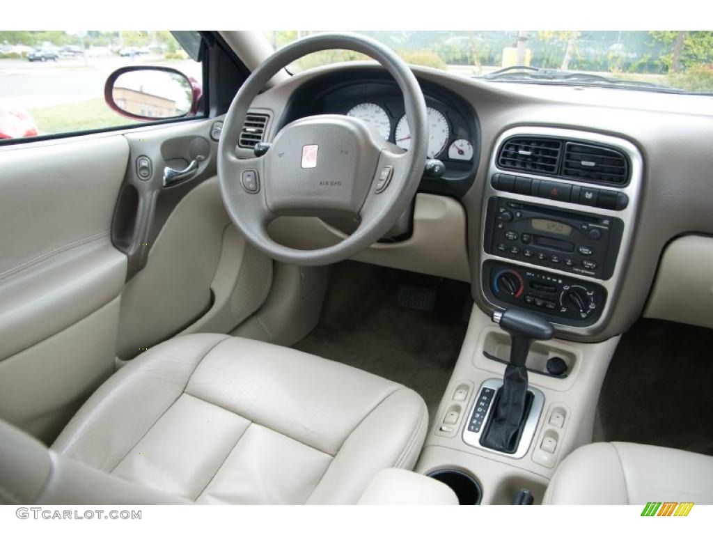 2005 L Series L300 Sedan - Berry Red / Tan photo #14