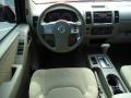 2008 Red Brawn Nissan Frontier LE Crew Cab  photo #9