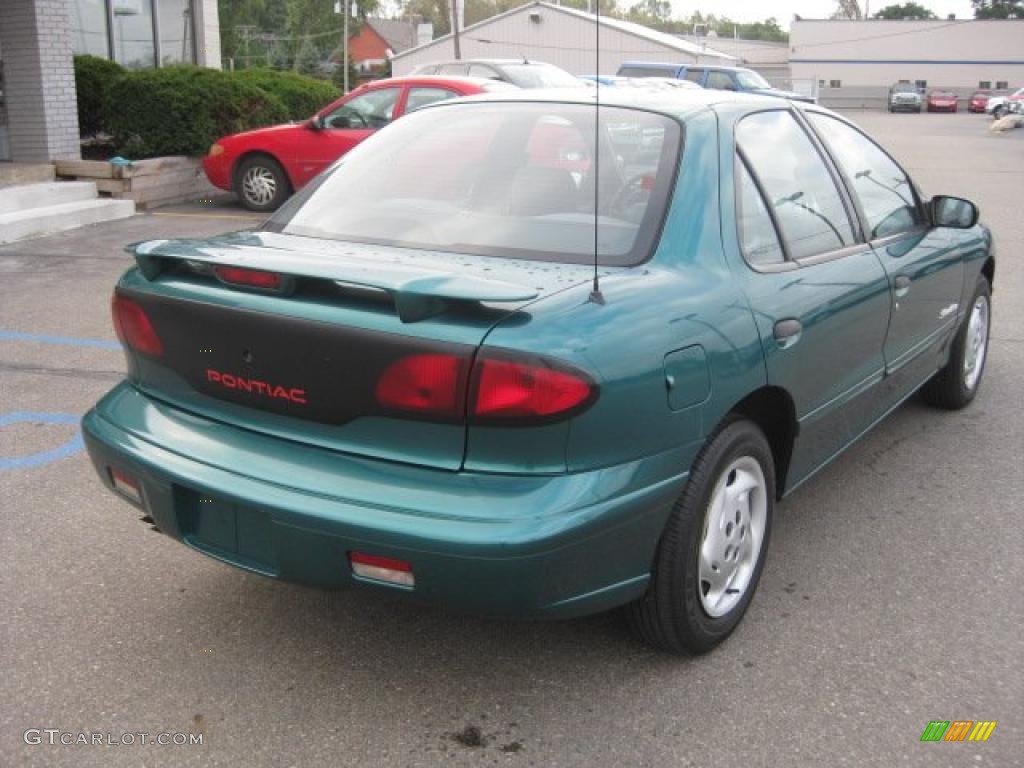 1999 Sunfire SE Sedan - Fern Green Metallic / Graphite photo #4