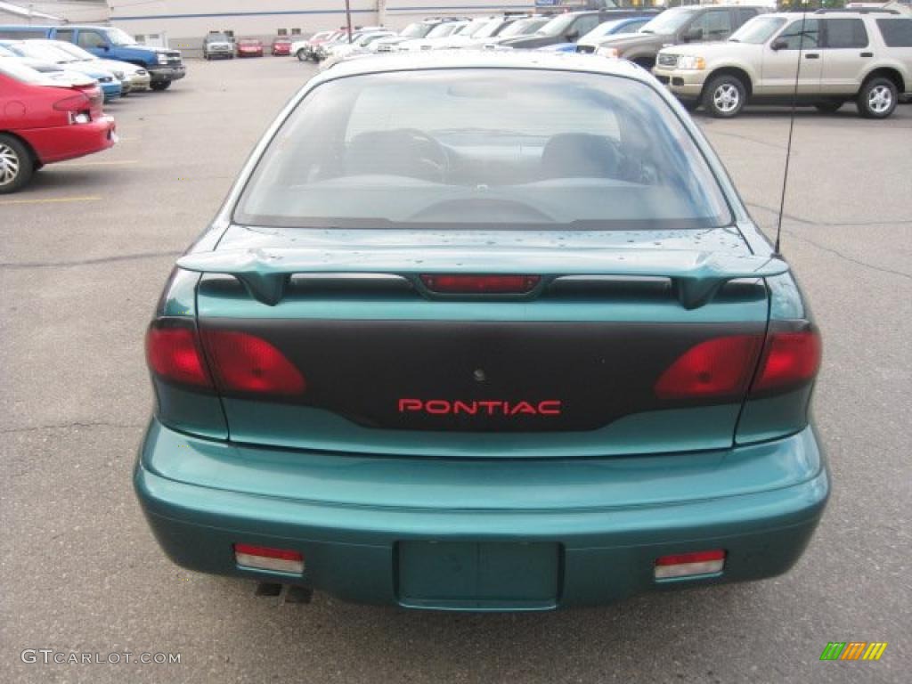 1999 Sunfire SE Sedan - Fern Green Metallic / Graphite photo #5