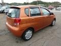 2004 Spicy Orange Chevrolet Aveo LS Hatchback  photo #4