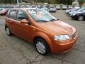 2004 Spicy Orange Chevrolet Aveo LS Hatchback  photo #6