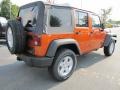 2011 Mango Tango Pearl Jeep Wrangler Unlimited Sport 4x4  photo #3