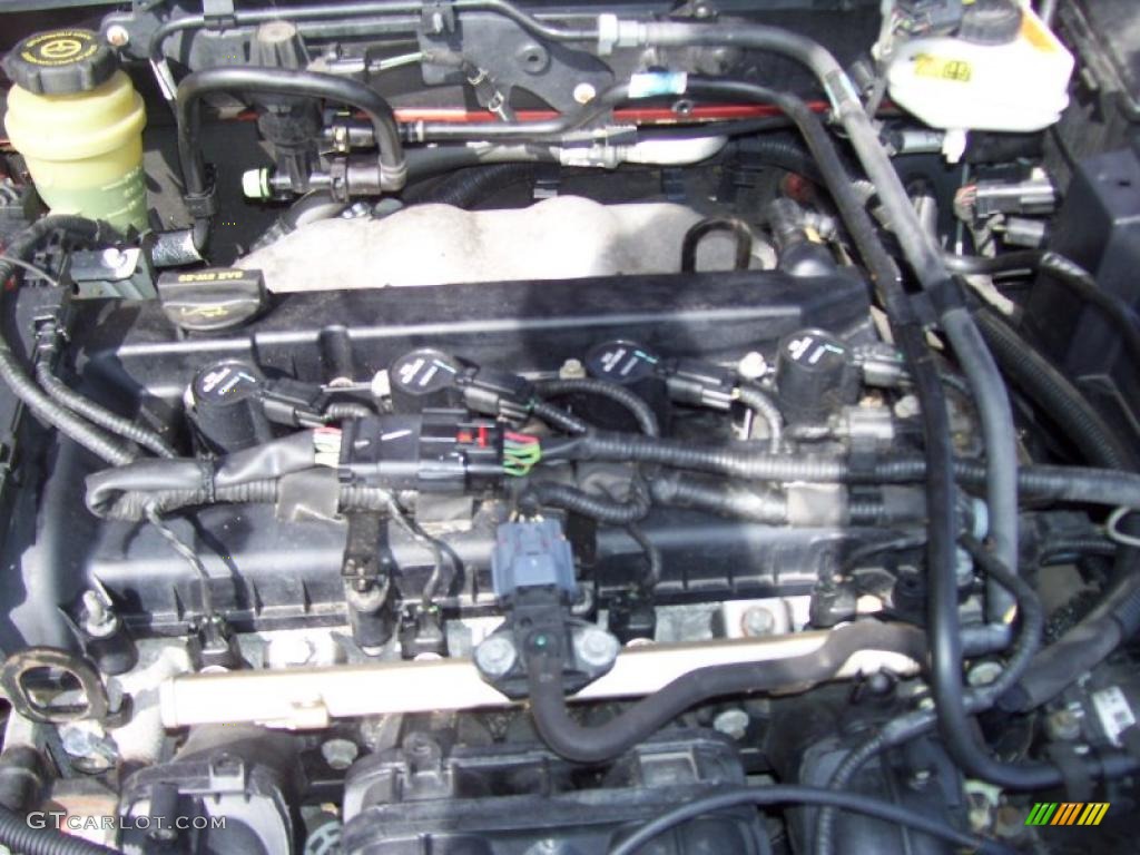 2005 Focus ZX3 SE Coupe - Blazing Copper Metallic / Dark Flint/Light Flint photo #10