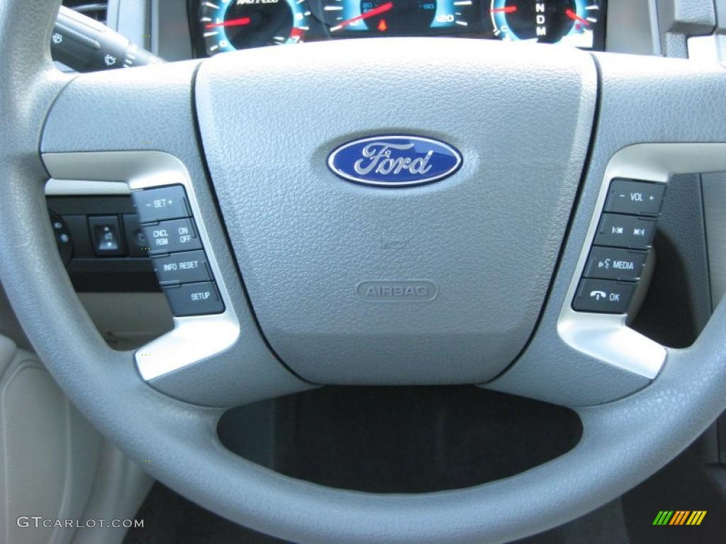 2011 Fusion SE V6 - Red Candy Metallic / Medium Light Stone photo #31