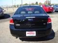 2011 Ebony Black Ford Focus SEL Sedan  photo #4