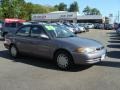 Misty Plum Pearl Metallic 1998 Toyota Corolla LE