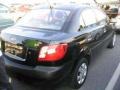 Midnight Black - Rio Sedan Photo No. 2