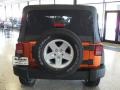 2011 Mango Tango Pearl Jeep Wrangler Unlimited Sport 4x4  photo #3