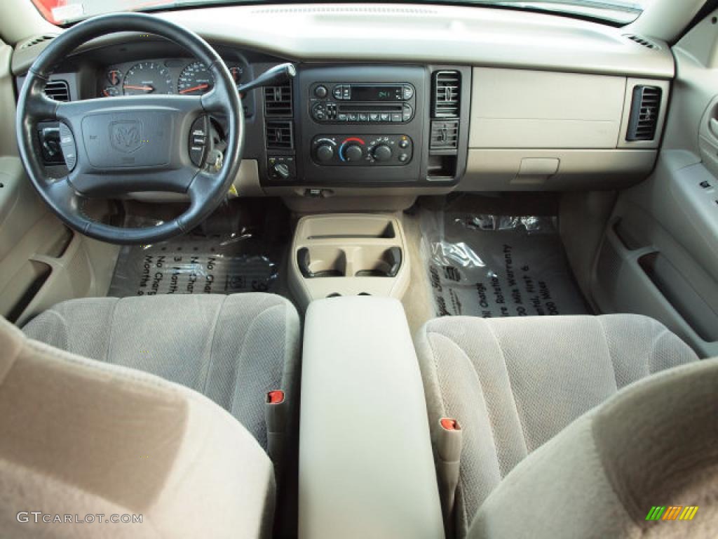 2004 Dakota Sport Quad Cab 4x4 - Patriot Blue Pearl / Taupe photo #10