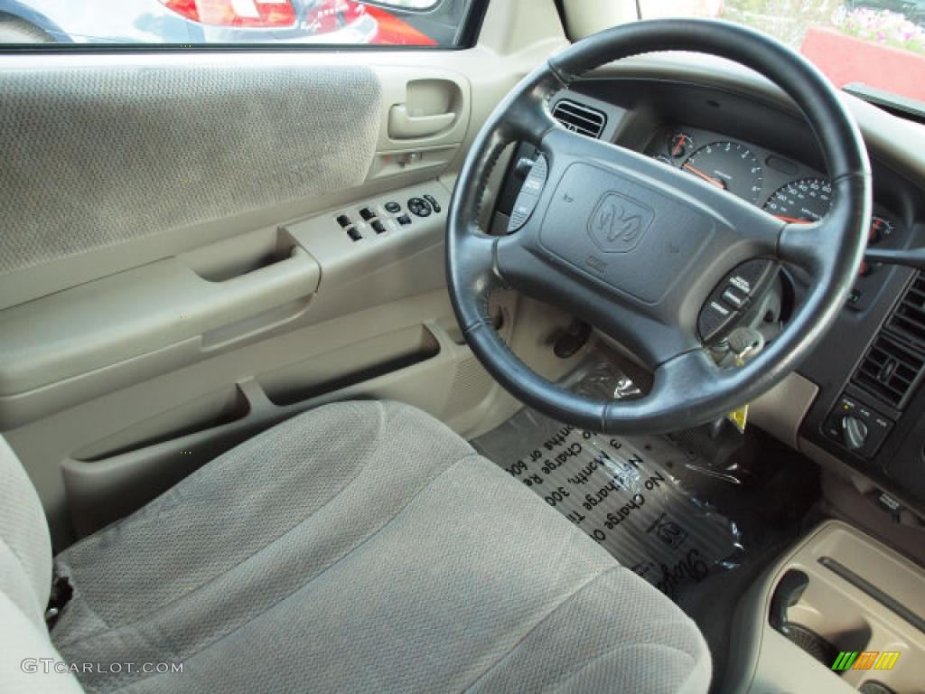 2004 Dakota Sport Quad Cab 4x4 - Patriot Blue Pearl / Taupe photo #11