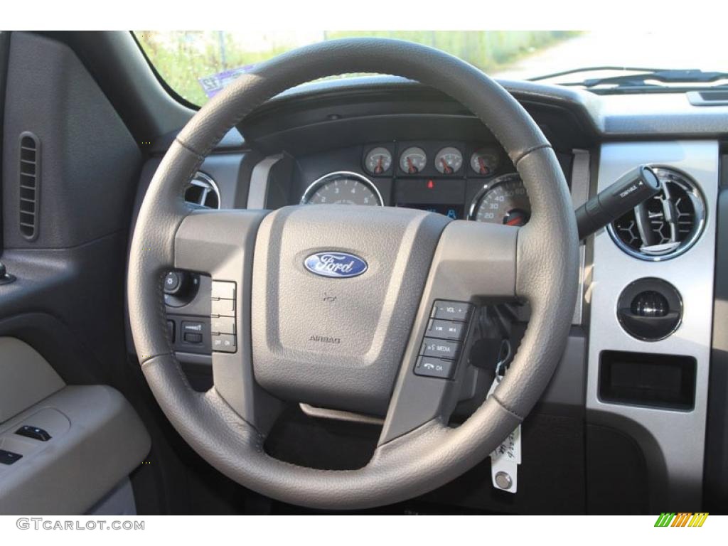 2010 F150 XLT SuperCrew - Tuxedo Black / Medium Stone photo #16