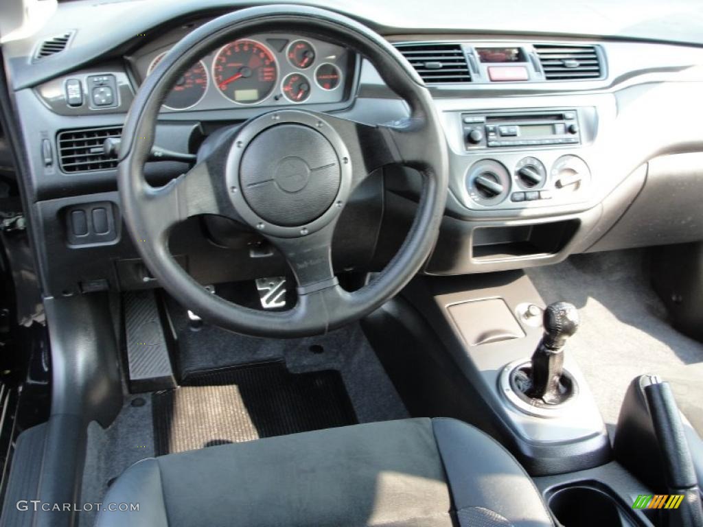 2006 Mitsubishi Lancer Evolution IX Black Alcantara Dashboard Photo #36948116
