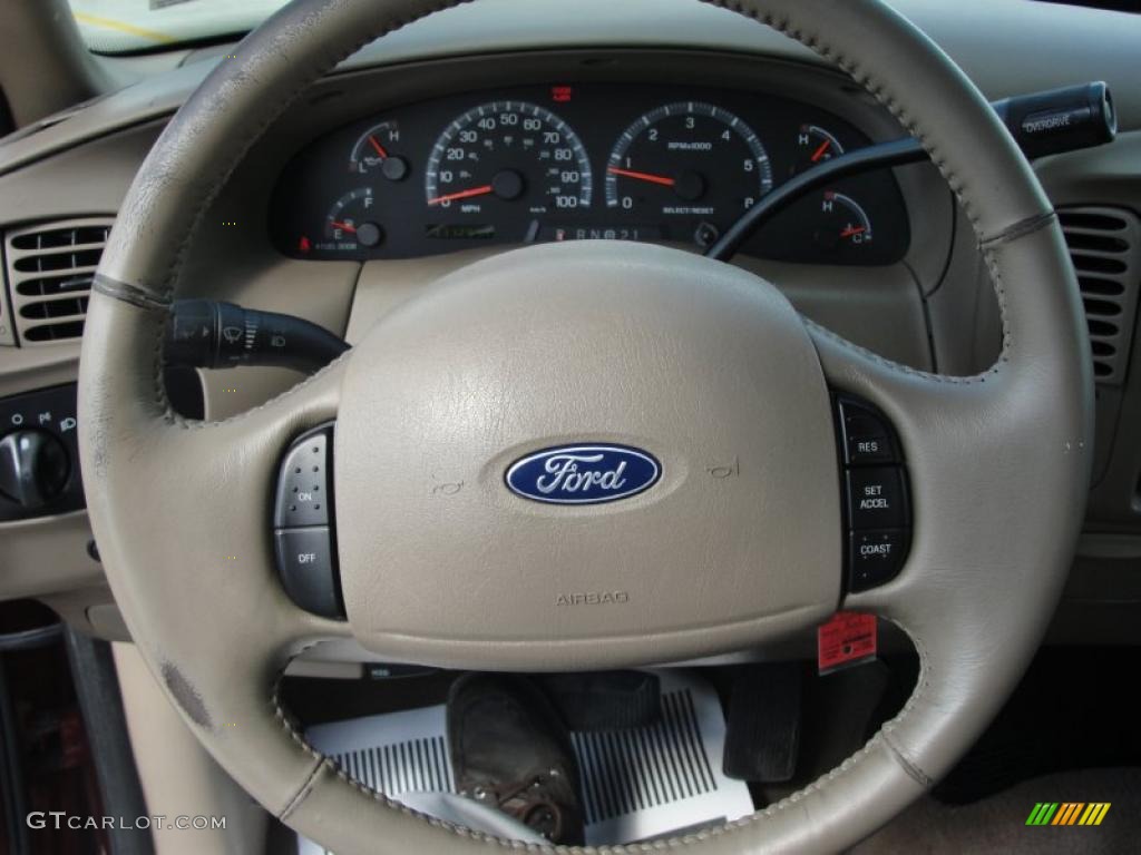 2003 F150 Lariat SuperCab - Toreador Red Metallic / Medium Parchment Beige photo #38