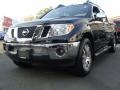 2009 Super Black Nissan Frontier LE Crew Cab 4x4  photo #3