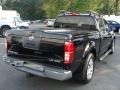 2009 Super Black Nissan Frontier LE Crew Cab 4x4  photo #4