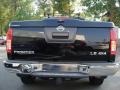 2009 Super Black Nissan Frontier LE Crew Cab 4x4  photo #7