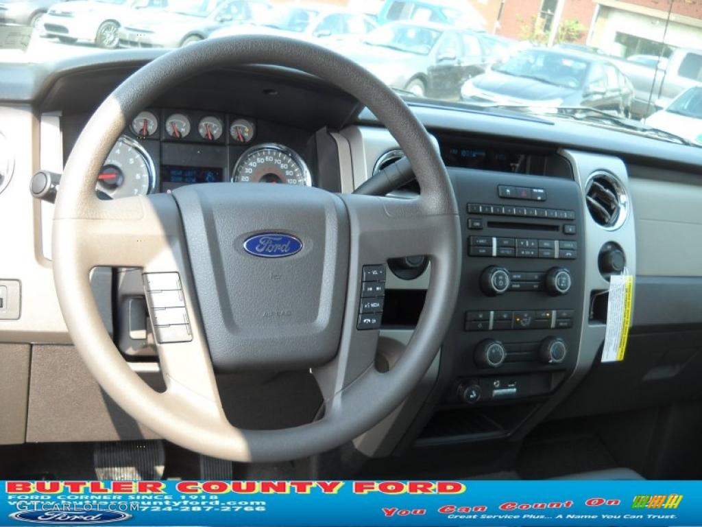 2010 F150 XLT SuperCab 4x4 - Dark Blue Pearl Metallic / Medium Stone photo #12