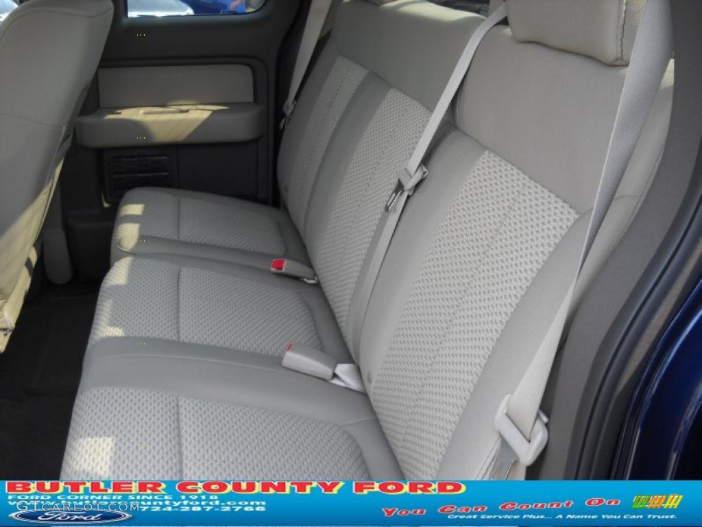2010 F150 XLT SuperCab 4x4 - Dark Blue Pearl Metallic / Medium Stone photo #13