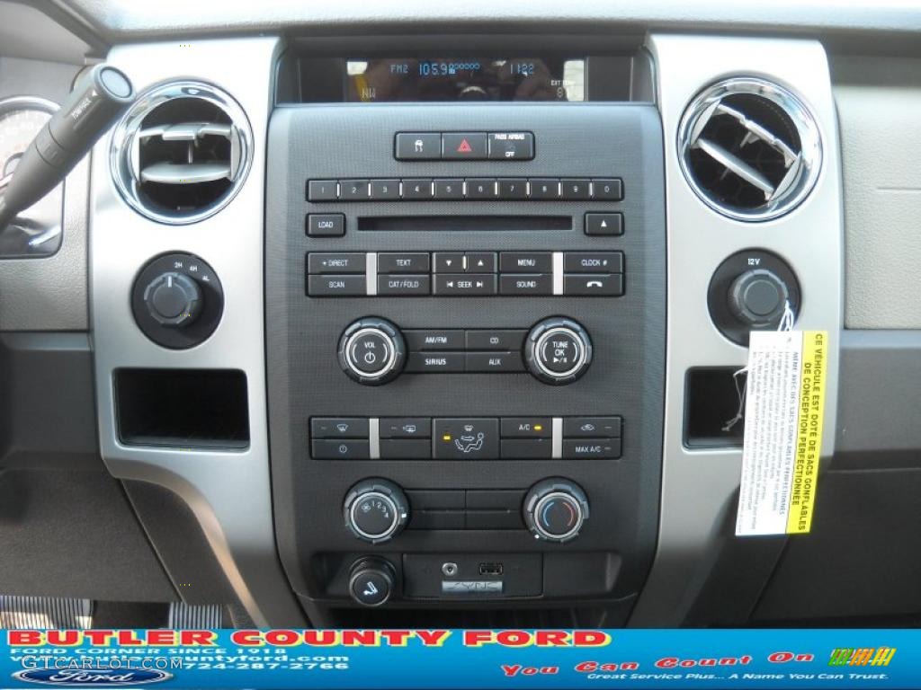 2010 F150 XLT SuperCab 4x4 - Dark Blue Pearl Metallic / Medium Stone photo #22