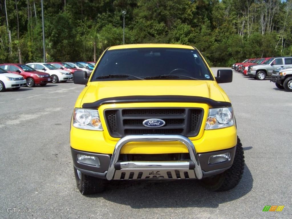 2004 F150 FX4 SuperCab 4x4 - Blazing Yellow / Black/Medium Flint photo #2