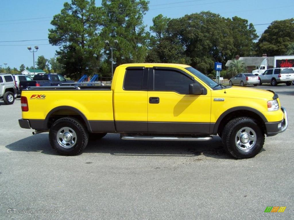 2004 F150 FX4 SuperCab 4x4 - Blazing Yellow / Black/Medium Flint photo #4