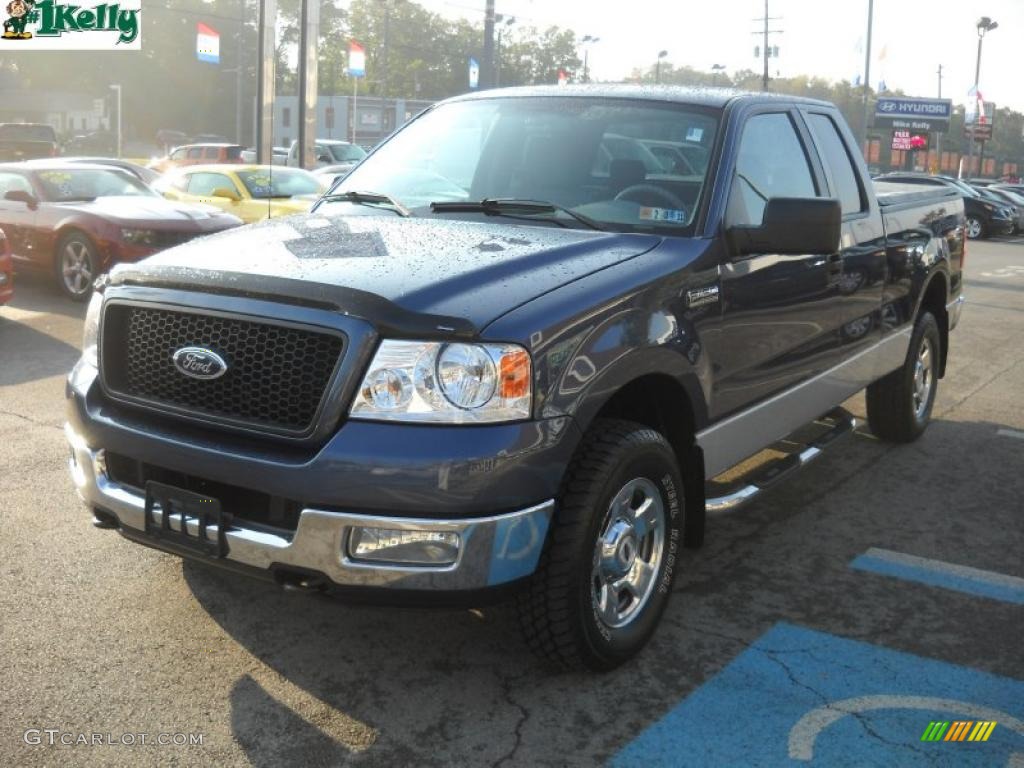2004 F150 XLT SuperCab 4x4 - True Blue Metallic / Black/Medium Flint photo #14