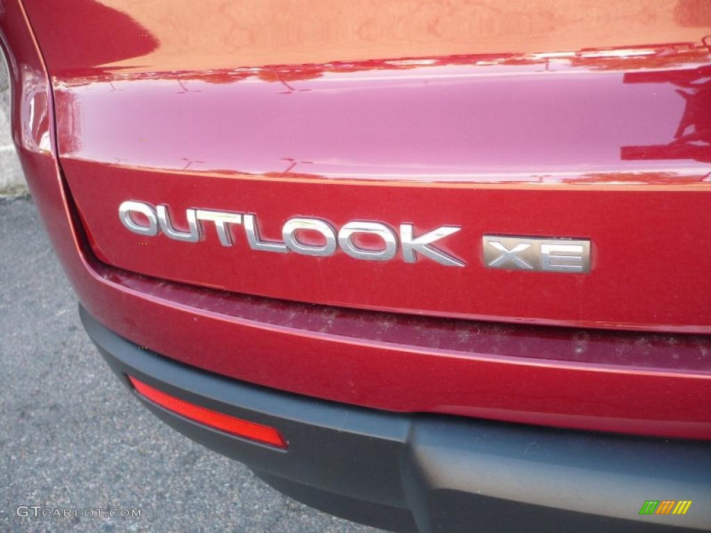 2010 Outlook XE AWD - Red Jewel / Tan photo #12