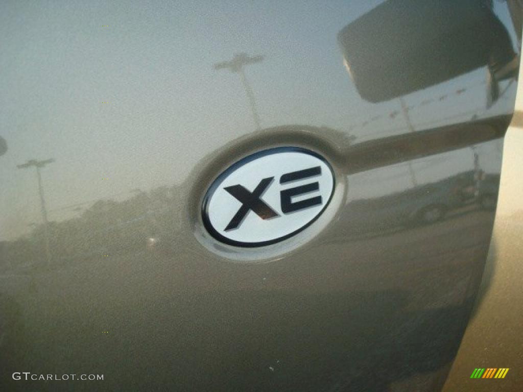 2002 Frontier XE King Cab - Gold Rush Metallic / Beige photo #20
