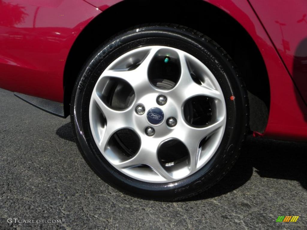 2011 Fiesta SEL Sedan - Bright Magenta Metallic / Charcoal Black/Blue Cloth photo #13