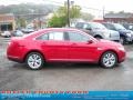 Red Candy - Taurus SEL AWD Photo No. 2