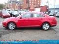 Red Candy - Taurus SEL AWD Photo No. 6
