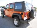 2011 Mango Tango Pearl Jeep Wrangler Unlimited Sport 4x4  photo #5