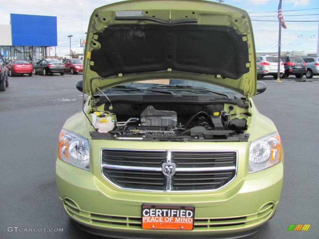 2010 Caliber SXT - Optic Green Metallic / Dark Slate Gray photo #23