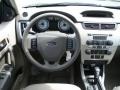 2011 Sterling Gray Metallic Ford Focus SES Sedan  photo #7