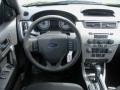 2011 Ebony Black Ford Focus SES Sedan  photo #7