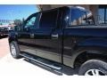 2006 Black Ford F150 Lariat SuperCrew 4x4  photo #21